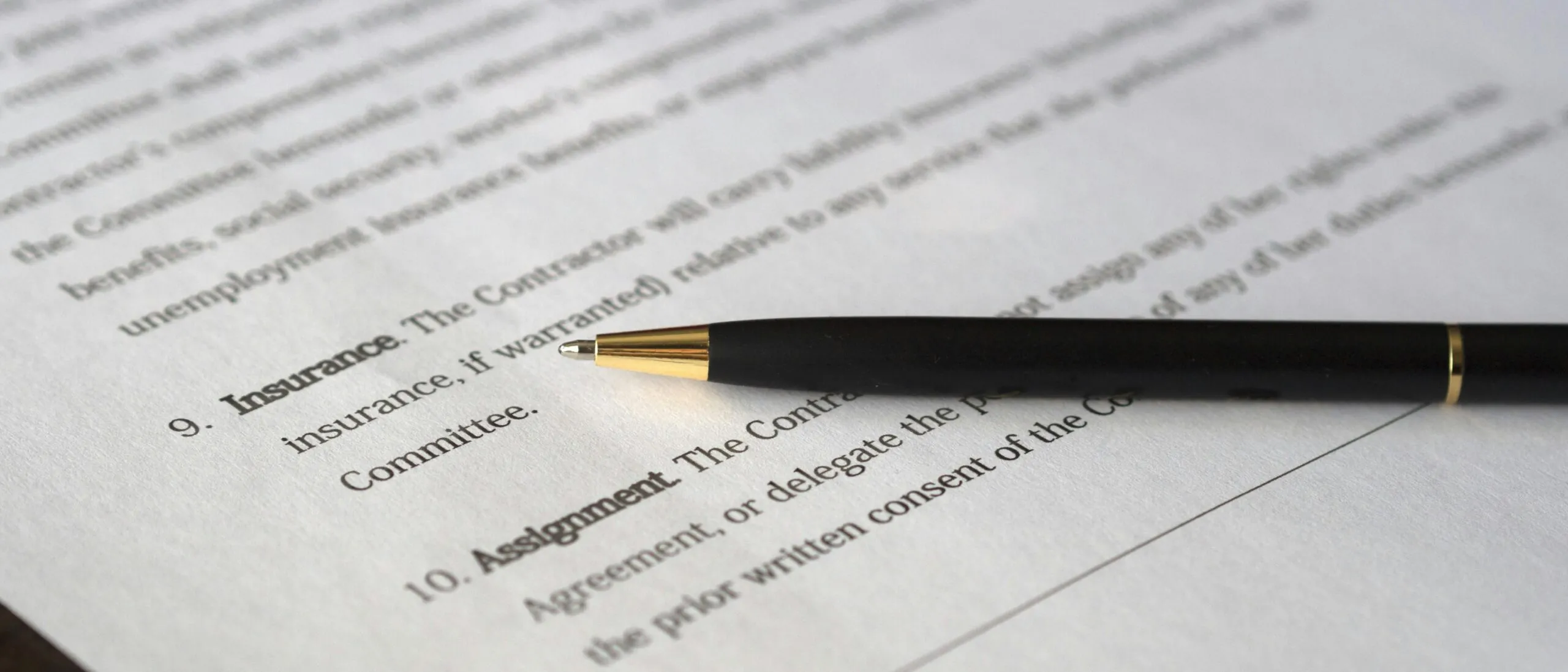 An insurance policy document on a desk