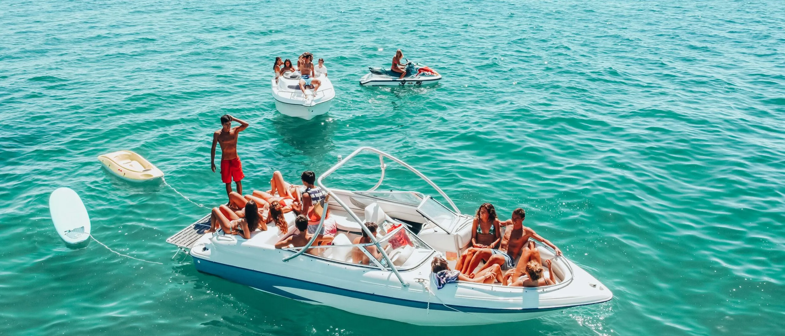 Family and friends on a boat in open water