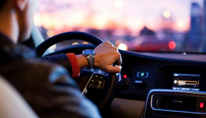 person driving a vehicle