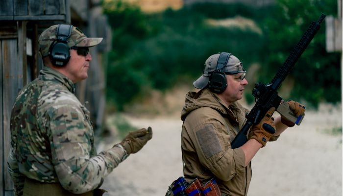 military tactical strategy rifle position for training on a professional shooting range trainer in