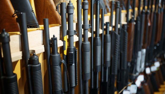 row-of-rifles-in-gun-shop-closeup